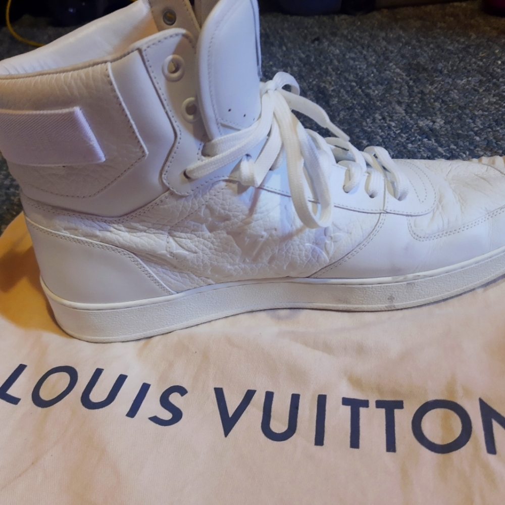 White Louis Vuitton hightop sneakers